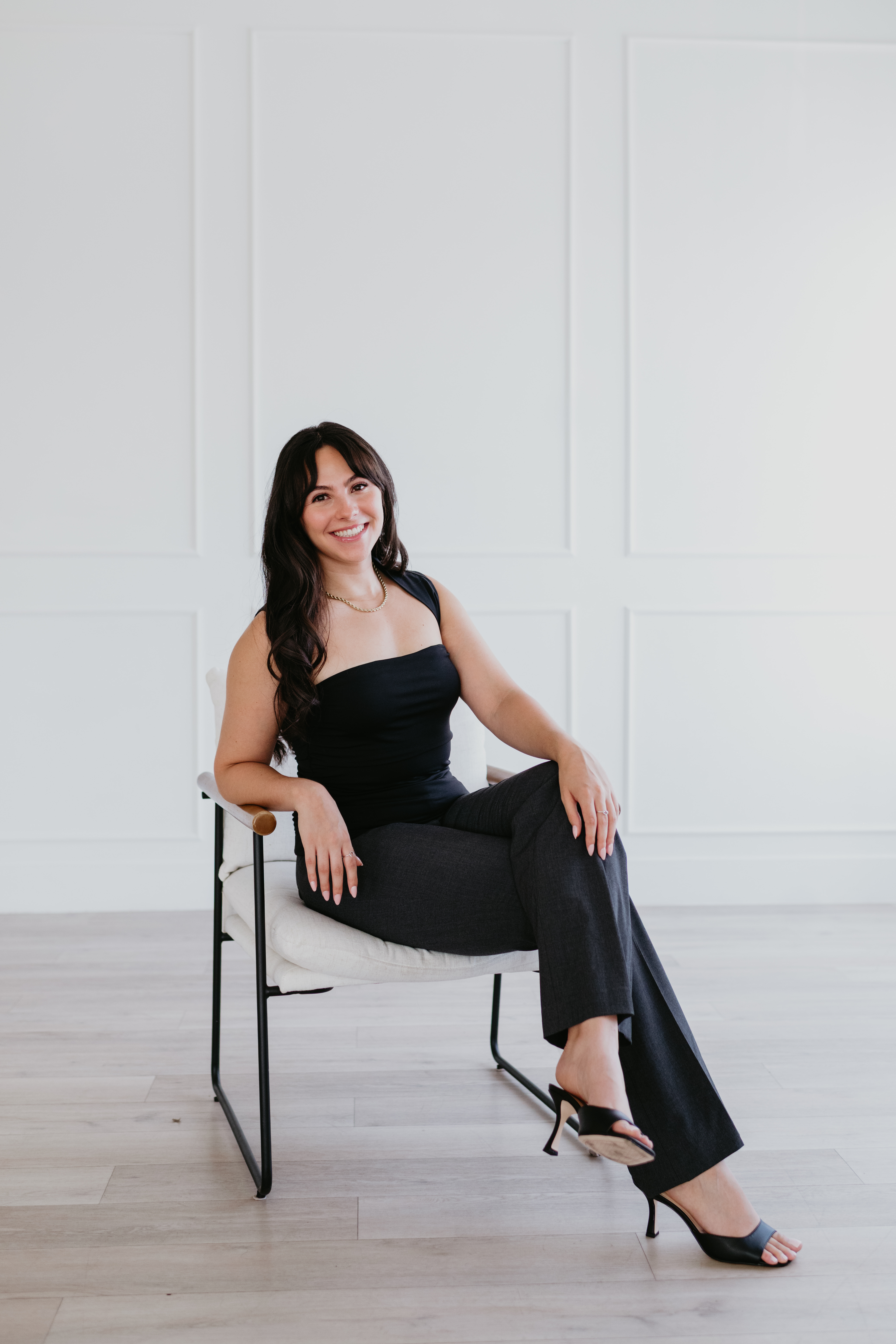 Social media expert seated in a studio chair